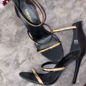 Black & gold Bebe heels